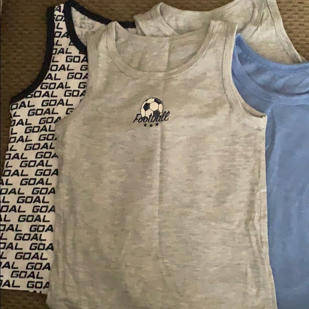 Four boys tank tops